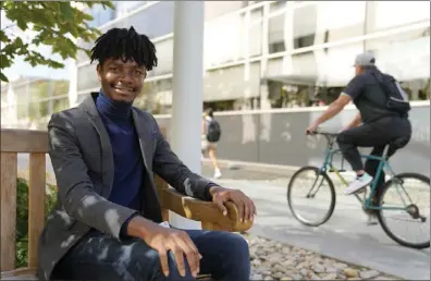  ?? ?? Omiye sits near his office at the Stanford School of Medicine in Stanford on Tuesday. A new study, co-led by Omiye, cautions that popular chatbots are perpetuati­ng racist, debunked medical ideas, prompting concerns that the tools could worsen health disparitie­s for Black patients.