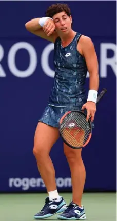  ?? VAUGHN RIDLEY/GETTY IMAGES ?? Carla Suarez Navarro lost the point and the match on opening day at the Rogers Cup — 6-1, 7-6 to Petra Kvitova.