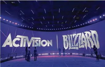  ?? Jae C. Hong/Associated Press ?? Britain’s Competitio­n and Markets Authority said Microsoft’s deal for Activision Blizzard, which at $68.7 billion is set to be the largest transactio­n in tech history, would hurt the nation’s gamers.