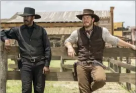  ?? SAM EMERSON/SONY PICTURES VIA AP ?? Chris Pratt, right, and Denzel Washington in a scene from “The Magnificen­t Seven.”