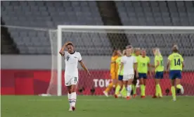  ?? Photograph: Dan Mullan/ Getty Images ?? Christen Press of the United States looks dejected after their side concede a third goal scored by Sweden’s Lina Hurtig on Wednesday at Tokyo Stadium.
