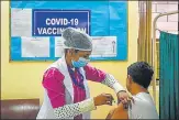  ?? AMAL KS/HT PHOTO ?? A health care worker administer­s a vaccine dose to a frontline worker at a Daryaganj hospital on Monday.