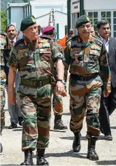  ?? — PTI ?? Chief of the Army Staff General Bipin Rawat, with 15 Corps Commander Lt. Gen. A. K. Bhatt, takes a round of Army Goodwill Public School, Lidru Pahalgam, in Anantnag district of south Kashmir on Friday.