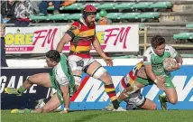  ?? PHOTOS: WARWICK SMITH/STUFF ?? Junior Laloifi dots down against Waikato, as the Turbos made the best possible start to their campaign.