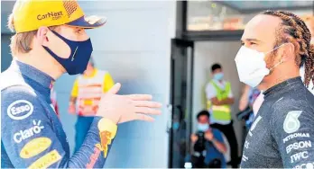  ?? ?? Two for the show: Max Verstappen and Lewis Hamilton in discussion prior to Silverston­e and Monza clashes.