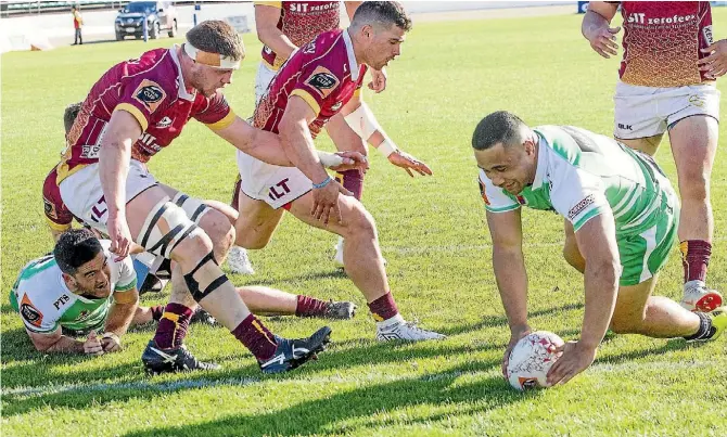  ?? WARWICK SMITH/ STUFF ?? Ngani Laumape scores for the Manawatu¯ Turbos against Southland yesterday in Palmerston North.