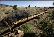  ?? MATTHEW JONAS — STAFF PHOTOGRAPH­ER ?? Winds were reported at more than 90mph in some areas of the county Saturday, April 6. Crews worked on lines around the county after the storm, including broken utility poles along U.S. 36 between Lefthand Canyon Drive and Nelson Road.