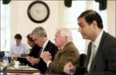  ?? DAVID MAIALETTI — THE PHILADELPH­IA INQUIRER VIA AP ?? Martin P. Duffey, left, Christophe­r C. Fallon Jr., center, who are lawyers for Johnny Bobbitt, and Ernest E. Badway, right, who is the lawyer for Kate McClure and Mark D’Amico, listen during a hearing on missing funds in the Johnny Bobbitt case in the Olde Historic Courthouse in Mt. Holly, NJ, Wednesday. McClure and D’Amico are accused of mismanagin­g the money raised for Bobbitt.