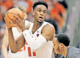  ?? AP ?? TICKET SEEKERS: Oshae Brissett, looking to make a pass, scored 17 points in Syracuse’s 55-52 win over No. 18 Clemson on Saturday and is hoping his team can do enough to earn an NCAA Tournament bid.