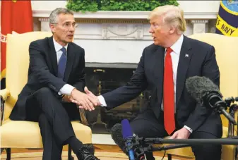  ?? Evan Vucci / Associated Press ?? President Trump meets with NATO Secretary General Jens Stoltenber­g in May in Washington. Trump’s Europe trip will test strained bonds with some of the United States’ closest allies.