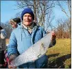  ?? LISA MITCHELL — MEDIANEWS GROUP ?? Dreibelbis Farm Historical Society President Mark Dreibelbis holding a chunk of ice from the 19th century Pennsylvan­ia German ice harvest.