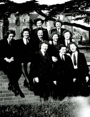  ??  ?? Joyce Davey (middle row, second from right) with the women she worked with at Bletchley