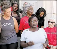  ?? Arkansas Democrat-Gazette/THOMAS METTHE ?? Activist Vicki Hatter (center) voices her concern about the Little Rock School District’s plan to raise the district’s annual debt payment.