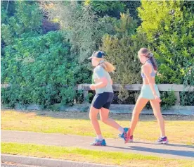  ?? Photo / Supplied ?? Leah Quinn and Lola Fitzpatric­k on their Bowel Cancer NZ fundraisin­g fun run.