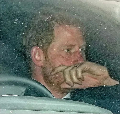  ?? ?? Pensive: Prince Harry arrives back at Windsor yesterday after spending the night at Balmoral in Scotland