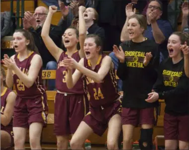  ?? JEN FORBUS — FOR THE MORNING JOURNAL ?? The Avon Lake bench celebrates a score late in the fourth quarter on Feb. 28.