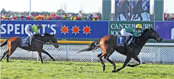  ?? Picture / Race Images ?? Kate Cowan rides Nashville to victory in Saturday’s $100,000 Winter Cup at Riccarton.