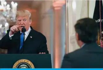  ??  ?? WASHINGTON: US President Donald Trump points to journalist Jim Acosta from CNN during a post-election press conference in the East Room of the White House yesterday. — AFP