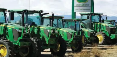  ?? Reuters ?? ↑
John Deere tractors are seen for sale at a dealer in Longmont, Colorado, US.