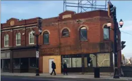  ?? PAUL WILSON PHOTO ?? A stone panel up top the building at King and Hess says “A.D. 1927”. But the truth is that it’s much older than that.