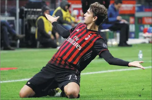  ?? ALESSANDRO GAROFALO / REUTERS ?? AC Milan’s Manuel Locatelli celebrates scoring against Juventus in the Italian Serie A match at the San Siro Stadium in Milan, on Saturday.