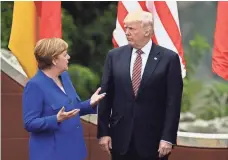  ?? MIGUEL MEDINA, AFP/GETTY IMAGES ?? German Chancellor Angela Merkel and President Trump in Sicily in May. They’ll meet again this week in Hamburg.