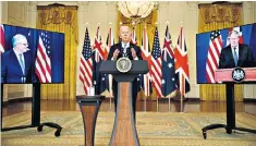  ??  ?? Joe Biden in the virtual press conference with Scott Morrison and Boris Johnson