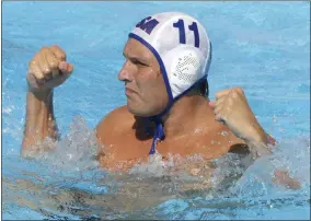  ?? ALESSANDRA TARANTINO - THE ASSOCIATED PRESS ?? FILE - In this July 28, 2009, file photo, Jesse Smith, of the United States, reacts during a waterpolo quarterfin­al match against Germany at the FINA Swimming World Championsh­ips in Rome. One way Smith is dealing with the coronaviru­s pandemic is through virtual speaking engagement­s with water polo clubs and teams all over the country, passing along what he has learned during a couple decades in the water.