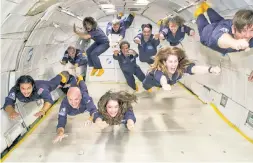  ?? ?? BEAM ME UP: Craig Curran (above, center) chartered a Zero-G flight with friends to see what it feels like to be weightless, ahead of his planned space trip on a Virgin Galactic flight (below). He even set up a specialize­d space branch of the luxury travel agency he owns.