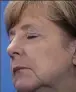  ??  ?? Merkel