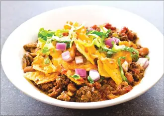  ?? Associated Press photo ?? This undated photo provided by America’s Test Kitchen shows a spicy beef taco bake in Brookline, Mass.