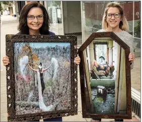  ?? Arkansas Democrat-Gazette/CARY JENKINS ?? Brandie Maldonado (left) and Samantha Copeland with photograph­s featuring them taken by Don Byram for the “Everyday a Warrior” series.