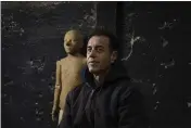  ?? GIANNI CIPRIANO — THE NEW YORK TIMES ?? Italian director Matteo Garrone with the wooden puppet he used to help depict Pinocchio in his film.