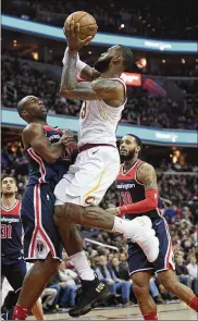  ?? NICK WASS / ASSOCIATED PRESS ?? Cleveland’s LeBron James is averaging a triple-double (26.8 points, 10.2 rebounds and 10.7 assists) over his last 13 games.