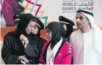  ?? Ryan Carter / Crown Prince Court – Abu Dhabi ?? Noura Al Kaabi, Minister of State for Federal National Council Affairs, and Dr Ali bin Tamim, general manager of Abu Dhabi Media, attend a ceremonial handover of the Special Olympics World Games to Abu Dhabi.