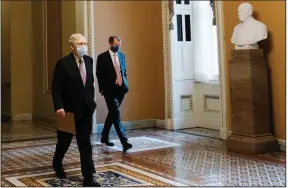  ?? (The New York Times/Anna Moneymaker) ?? Senate Majority Leader Mitch McConnell, R-Ky., heads to the Senate Chamber to open Wednesday’s proceeding­s. While the Senate has returned to Washington, the timing for the House to return hasn’t been set. House Democratic leaders are drafting plans for more aid to state and local government­s, something McConnell says should be put on pause.