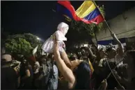  ?? (AP/Ivan Valencia) ?? Supporters of former rebel Gustavo Petro celebrate after he won a runoff election Sunday in Bucaramang­a, Colombia.