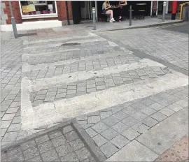  ??  ?? The pedestrian crossings in Laurence Street and Shop Street which are in need of refreshing ahead of the Fleadh.