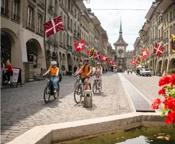  ?? PHOTOS: © BERN WELCOME, © OLIVER BAER ?? Art and Culture: (Top to bottom) Biking in Old City, bar at Old Tram Depot restaurant, and Zentrum Paul Klee museum