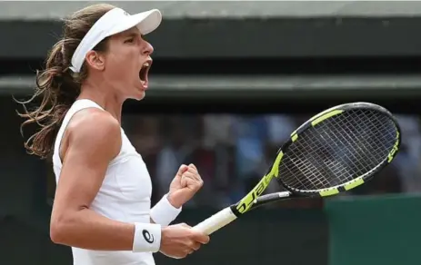  ?? OLI SCARFF/AFP/GETTY IMAGES ?? After beating Maria Sakkari on Friday, Johanna Konta has emerged as a favourite to be the first British woman to win Wimbledon since 1977.