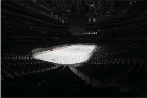  ?? NICK WASS - THE ASSOCIATED PRESS ?? The Capital One Arena, home of the Washington Capitals NHL hockey club, sits empty Thursday, March 12, 2020, in Washington. The NHL is following the NBA’s lead and suspending its season amid the coronaviru­s outbreak, the league announced Thursday.