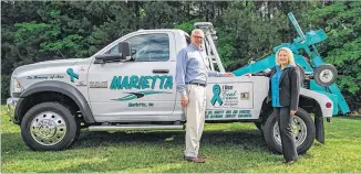  ?? CONTRIBUTE­D BY MARIETTA WRECKER SERVICE ?? Family members and business owners for Marietta Wrecker Services have kicked off a campaign to raise awareness and educate the community about ovarian cancer, in partnershi­p with the Georgia Ovarian Cancer Alliance.