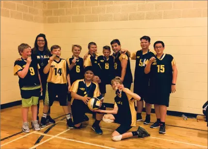  ?? Photo submitted to The McLeod River Post ?? The Holy Redeemer Volleyball Program has been very competitiv­eness this season. On the weekend of October 13, the Junior A Boys, Junior A Girls, and Junior B Boys all won gold at a tournament in Hinton. Here, the Junior B Boys celebrate with their gold medals.