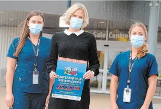  ?? TORSTAR FILE PHOTO ?? Niagara Falls Community Health Centre primary care and community director Carolyn Dyer, and registered nurses Nicole Racine and Jennifer Roland, before a series of drive-thru flu shot clinics last fall. Clinics will be held at Club Italia starting Nov. 2.