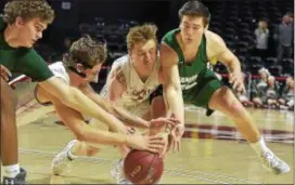  ?? PETE BANNAN — DIGITAL FIRST MEDIA ?? Bishop Shanahan’s Kevin Dodds, left and David Angelo, right, are too late to prevent Chris Mills, second from left, and Justin Heidig to close in on a loose ball Saturday at Temple.