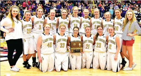  ?? PHOTO COURTESY OF SHELLEY WILLIAMS ?? Prairie Grove’s players are all smiles while posing with the 4A North Regional Championsh­ip trophy.