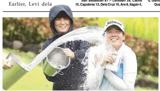  ?? JUN MENDOZA ?? Chiang Huang soaks in victory after beating three Thais in the rain-hit ICTSI Champion Tour.