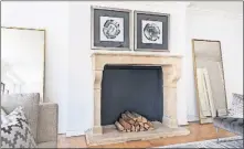  ?? [DESIGN RECIPES] ?? Large floor mirrors on either side help highlight a fireplace and reflect light.