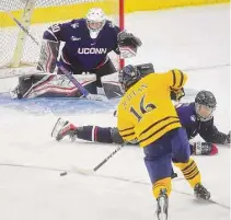  ?? Brian A. Pounds / Hearst Connecticu­t Media ?? Quinnipiac's Jacob Quillan fires a shot on UConn goalie Arsenii Sergeev on Saturday.