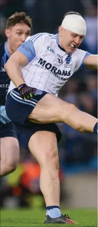  ??  ?? A heavily bandaged Niall Ronan lets fly as Westport’s Phil Keegan attempts to block during Sunday’s final.